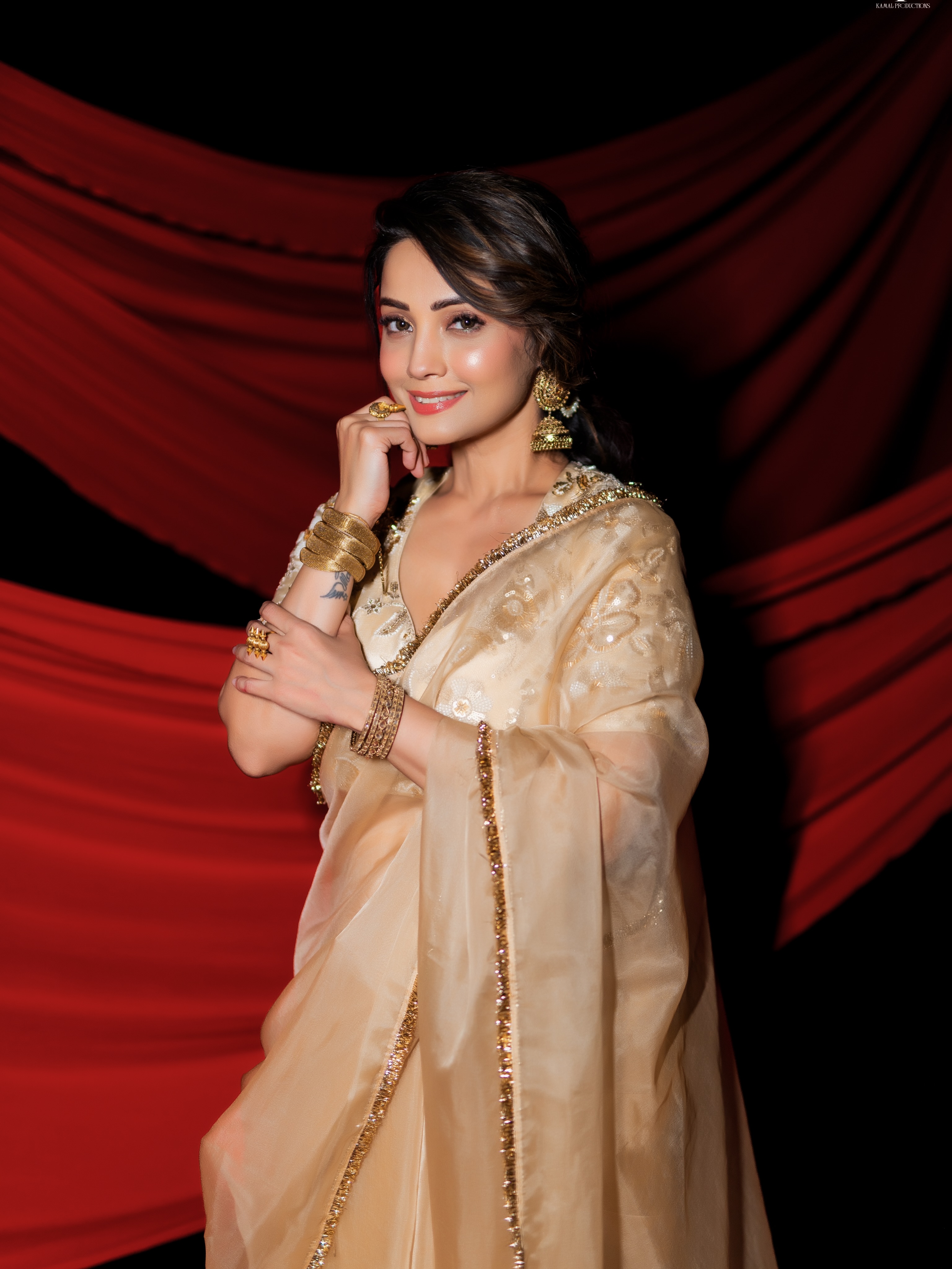 Adaa Khan Exudes Grace In A Champagne Saree