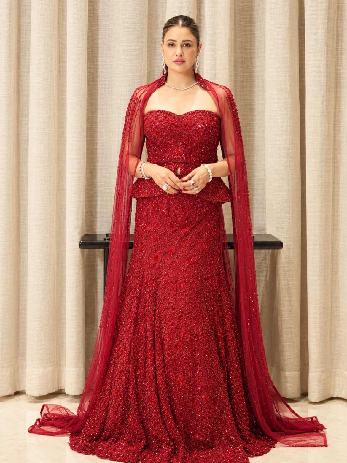 Yuvvika Chaudhary Oozes Hotness In A Sparkling Red Gown