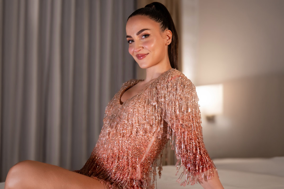Elli AvrRam Sparkles In A Rose Gold Fringe Dress