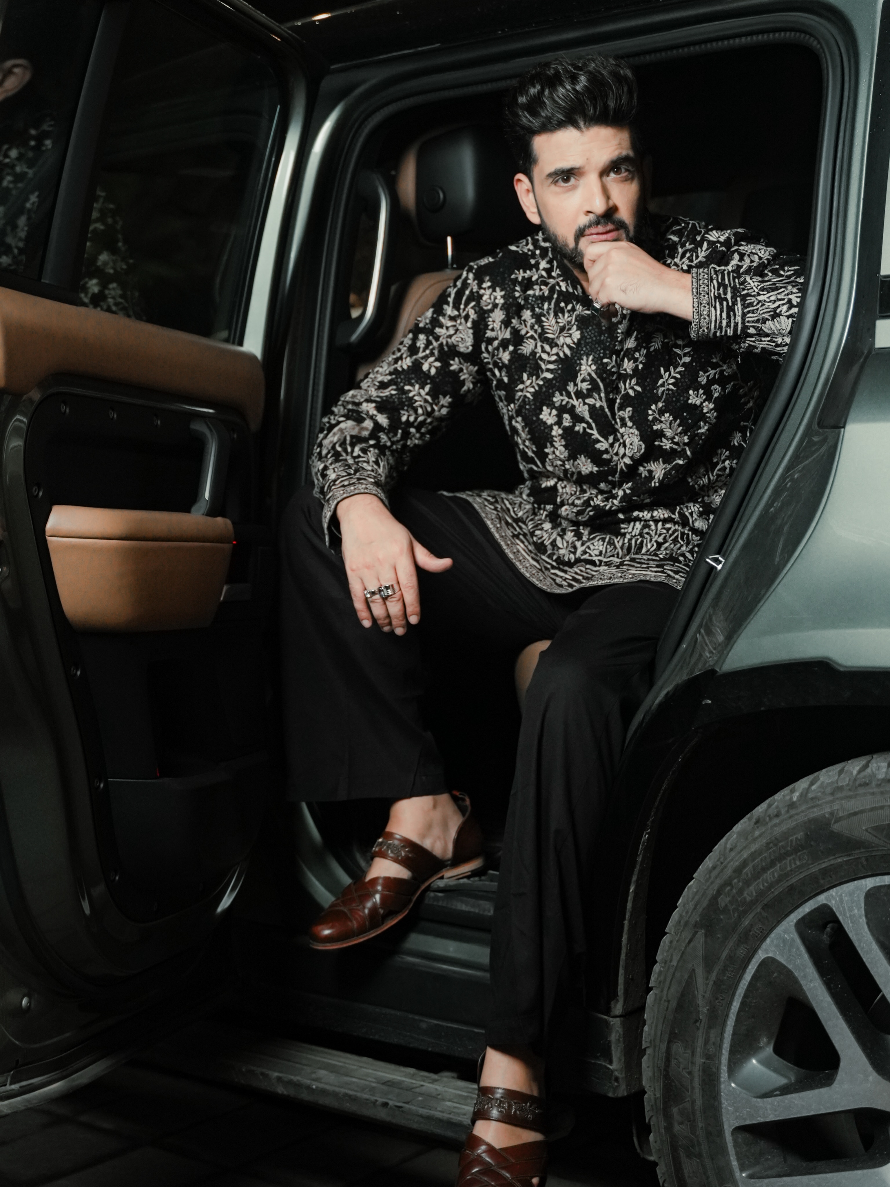 Karan Kundrra keeps the styling polished and understated, letting the ornate craftsmanship and impeccable tailoring speak for themselves.