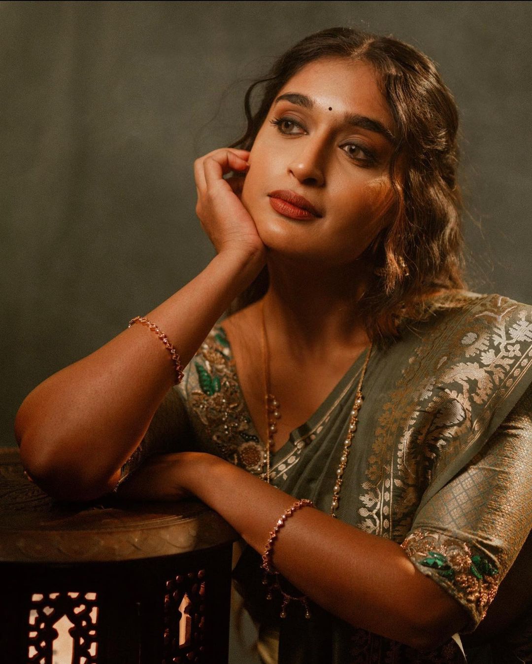 Vintage Vibes: Niharika Channels 90's Chic in Subtle Green