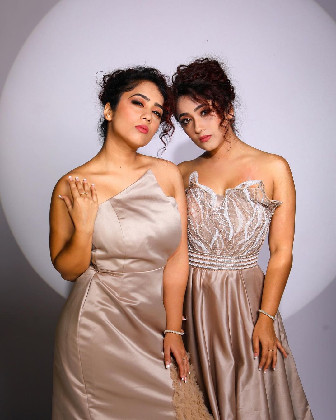 Sibling-duo Surabhi and Samriddhi Twin in Off-Shoulder Silk Gown