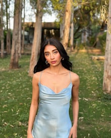 Dolly Singh Radiates Summer Vibes in Sky Blue Cowl Strappy Dress
