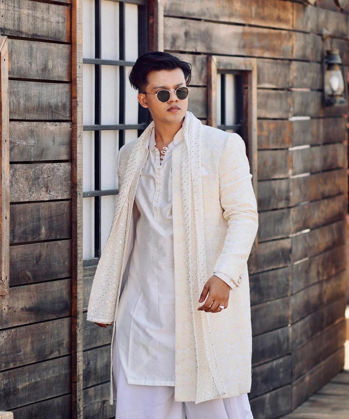 Riyaz Aly Channels Elegance in White Kurta and Sunglasses