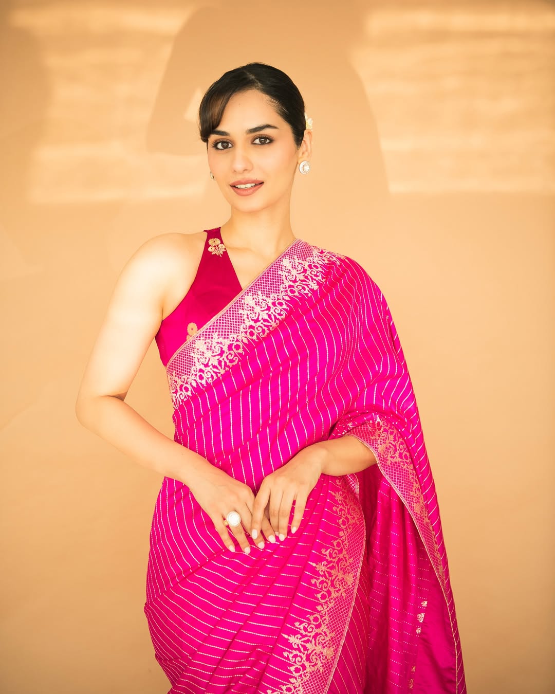 Manushi Chhillar's Ethnic Charm in a Pink Saree