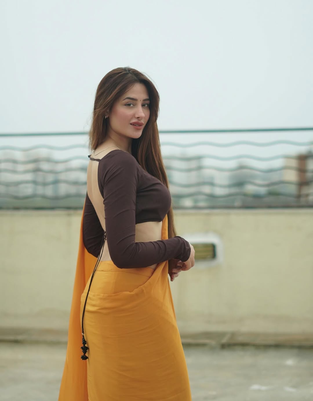 It's Backless! Mahira Sharma Dazzles in Saree