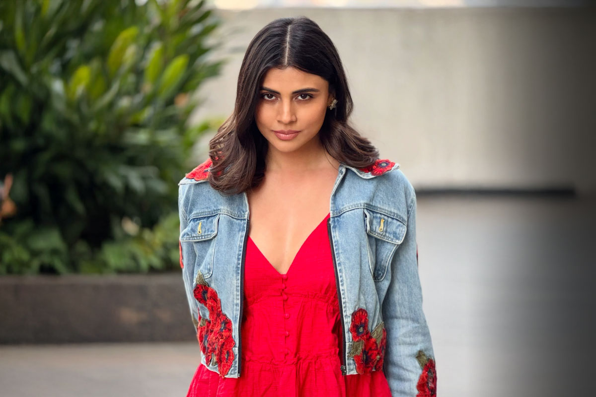 Malti Chahar Turns A Simple Red Fit Into A Whole Vibe