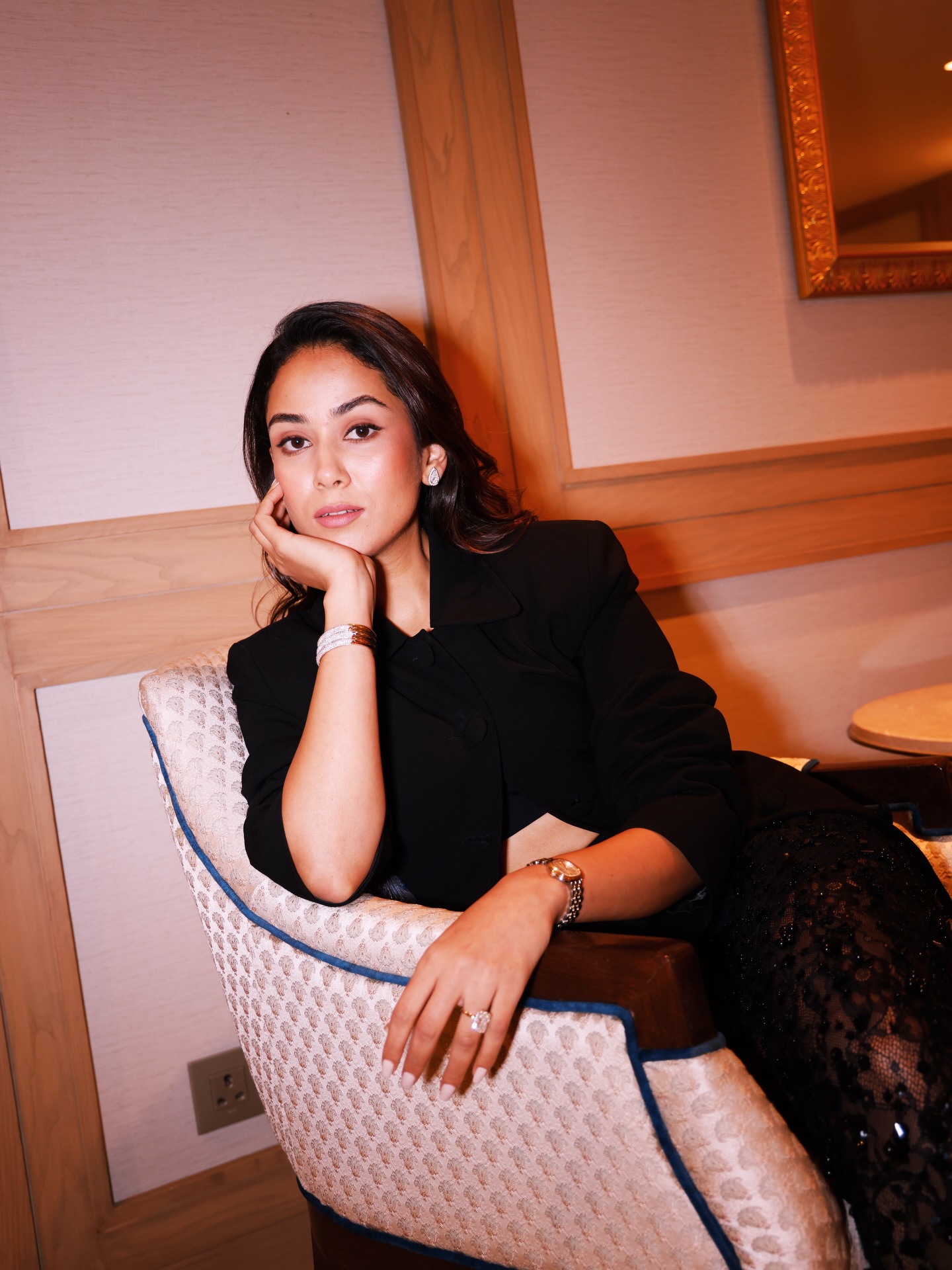 Mira Kapoor wears a sharp black jacket that brings clean lines and a crisp, structured finish.
