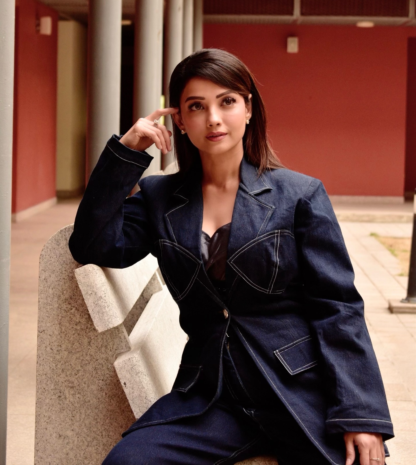 Adaa Khan pairs the structured jacket with wide-leg trousers, creating a balanced and fashion-forward silhouette.