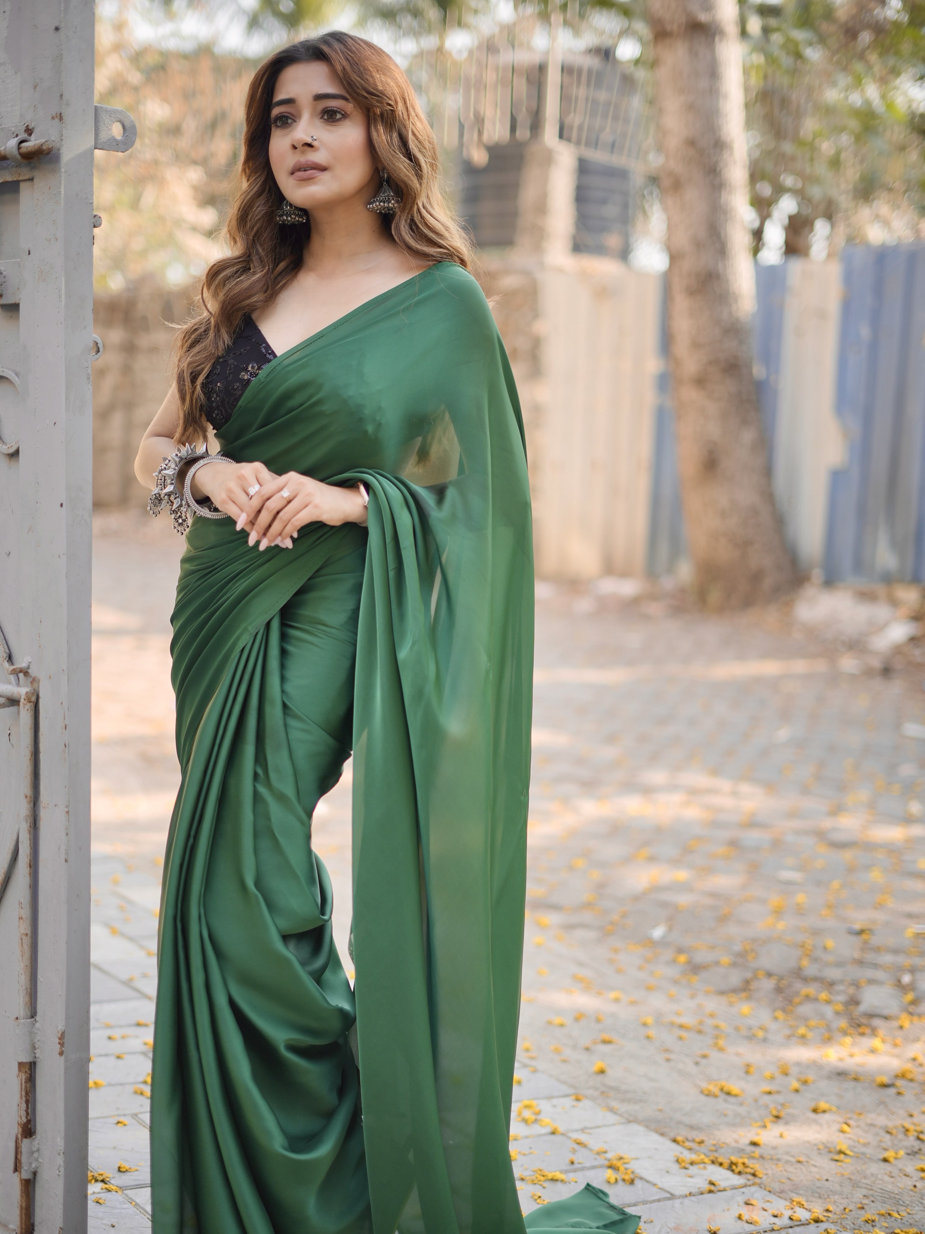 Tina Datta lets the beautifully draped silhouette do the talking, creating a look that feels graceful, polished, and timeless.