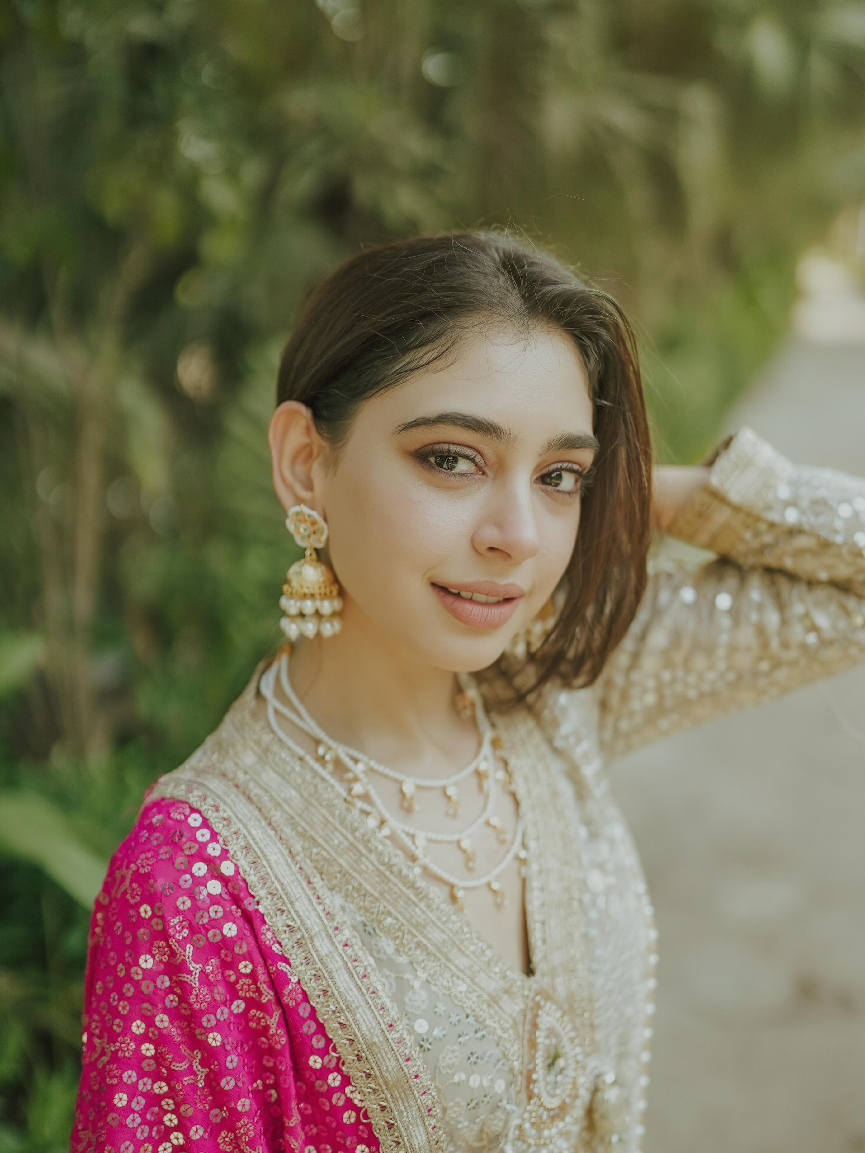 Niti Taylor effortlessly carries the flowing silhouette, creating a dreamy fashion moment with every step.