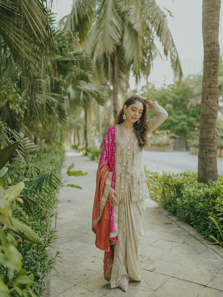 Niti Taylor's outfit shines with intricate embroidery and timeless detailing that celebrate classic ethnic craftsmanship.