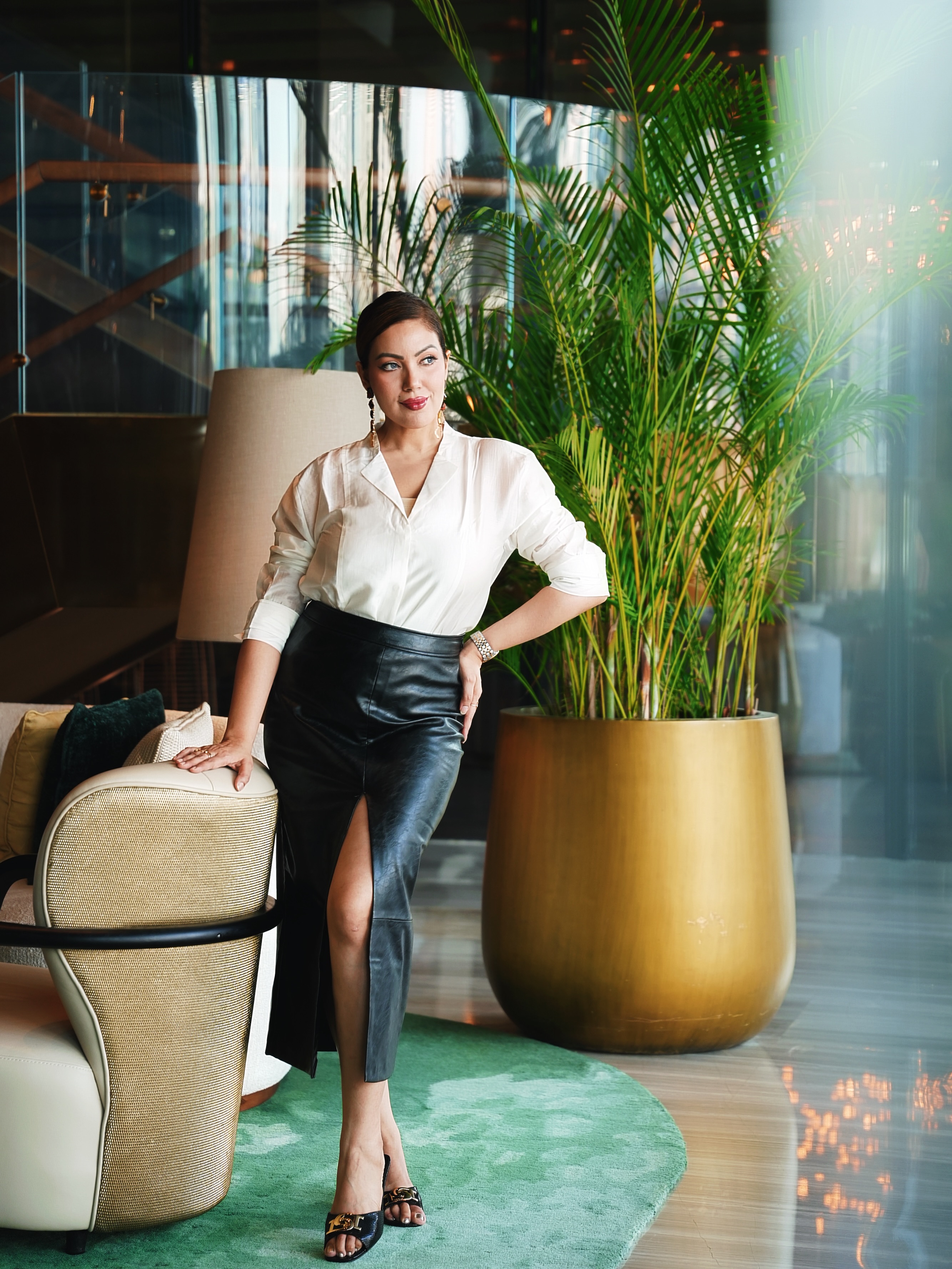 Munmun Dutta lets the tailored silhouette shine, with the leather skirt adding a bold edge to the refined look.