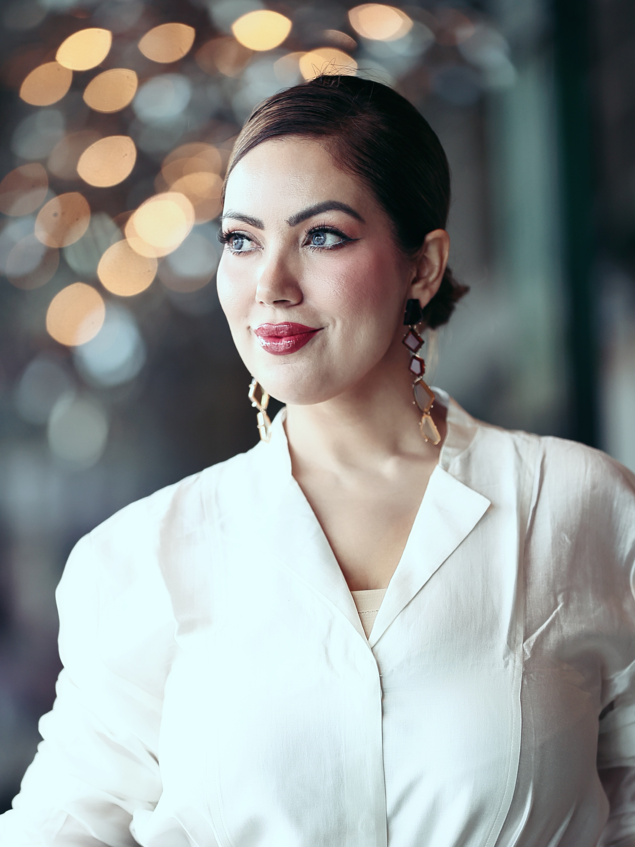 Munmun Dutta completes the outfit with elegant heels and a sophisticated hairdo, creating a look that's effortlessly modern and stylish.
