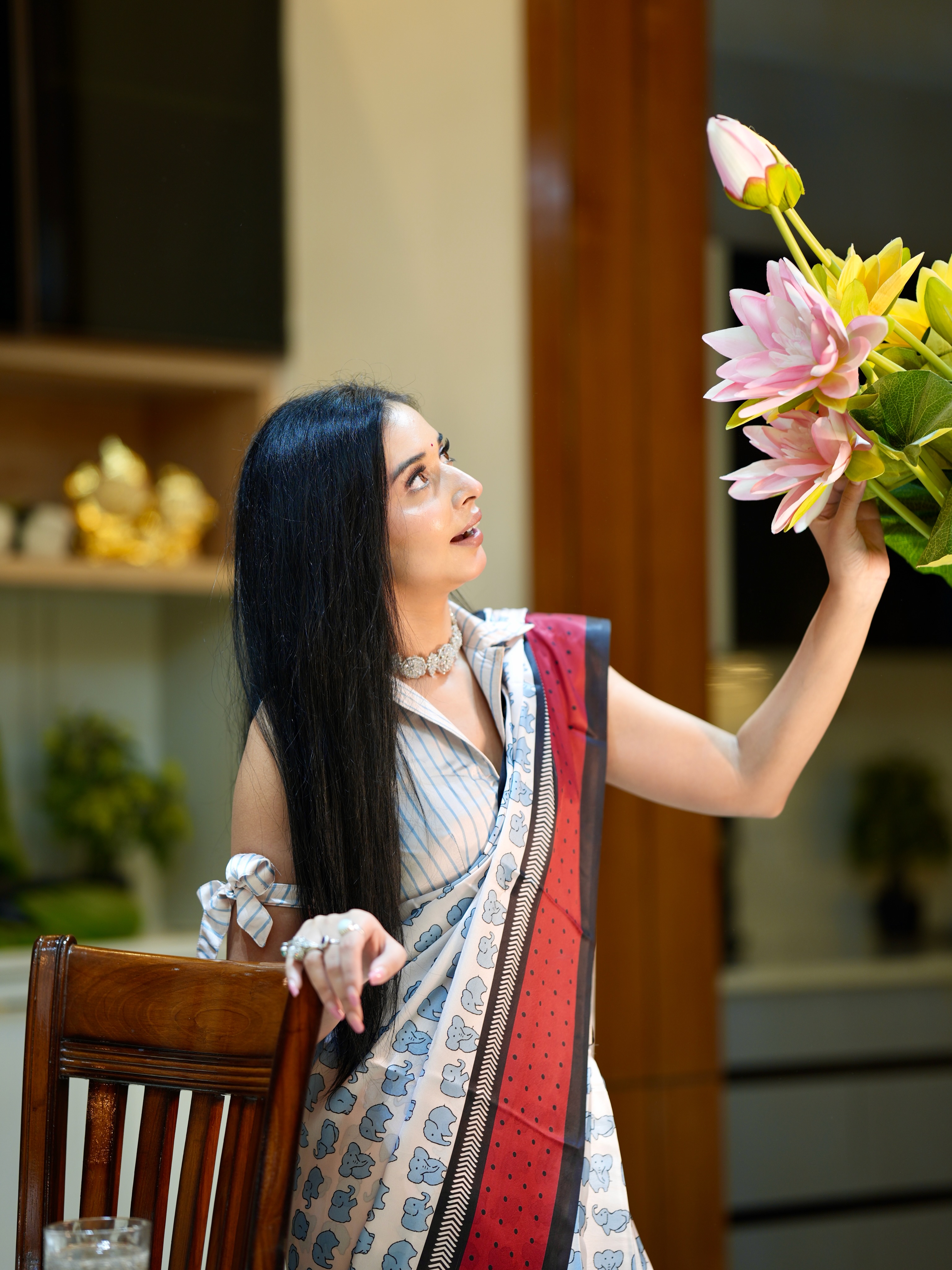 Tanya Mittal elevates the ensemble with striking jewellery and refined styling choices.