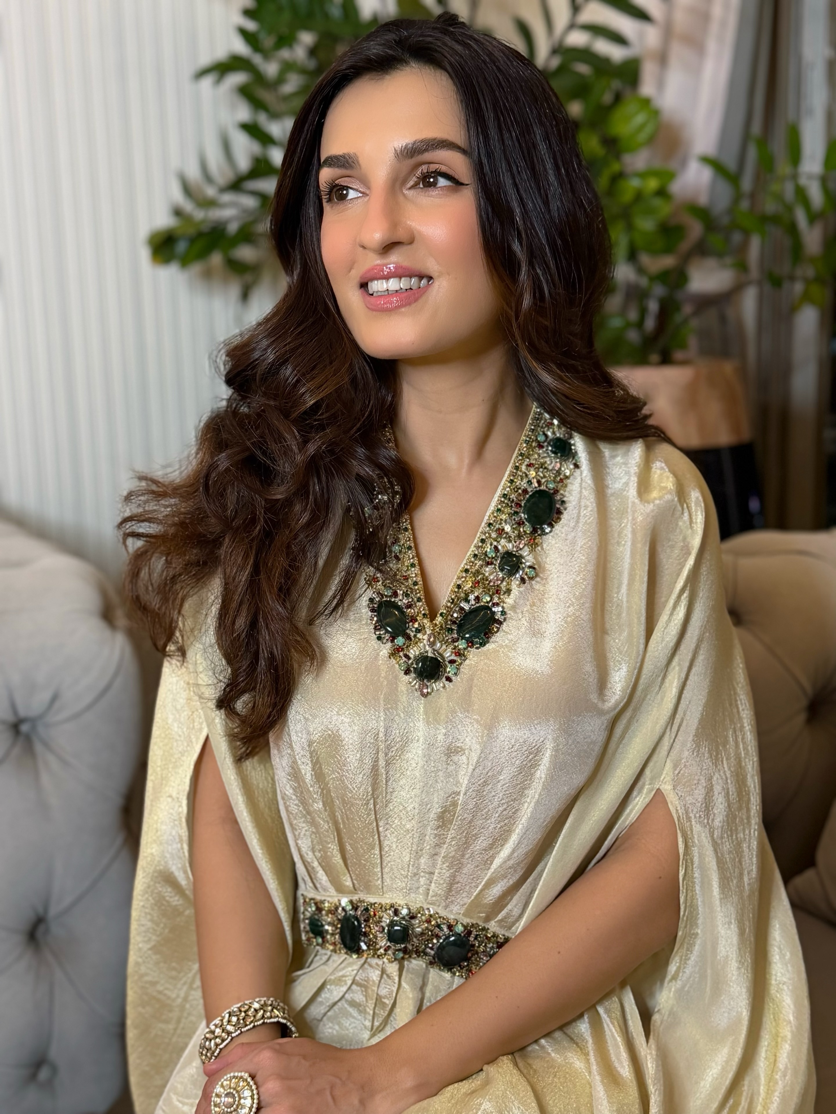 Shiny Doshi stuns in a fluid ivory ensemble featuring a relaxed silhouette and a subtle sheen that exudes effortless sophistication.