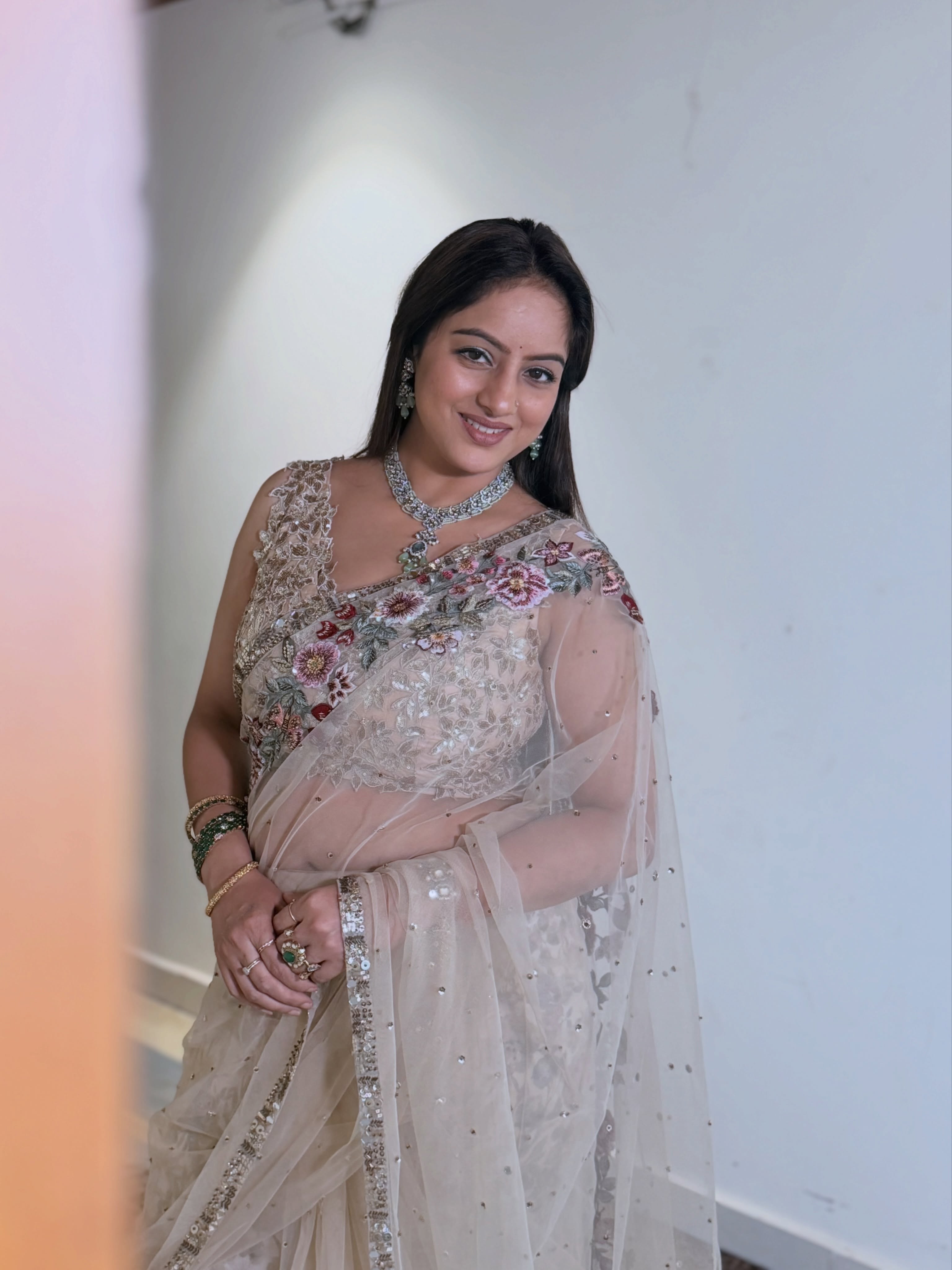 Deepika Singh looks stunning in a dreamy ivory saree adorned with delicate embellishments, creating a refined and sophisticated statement.