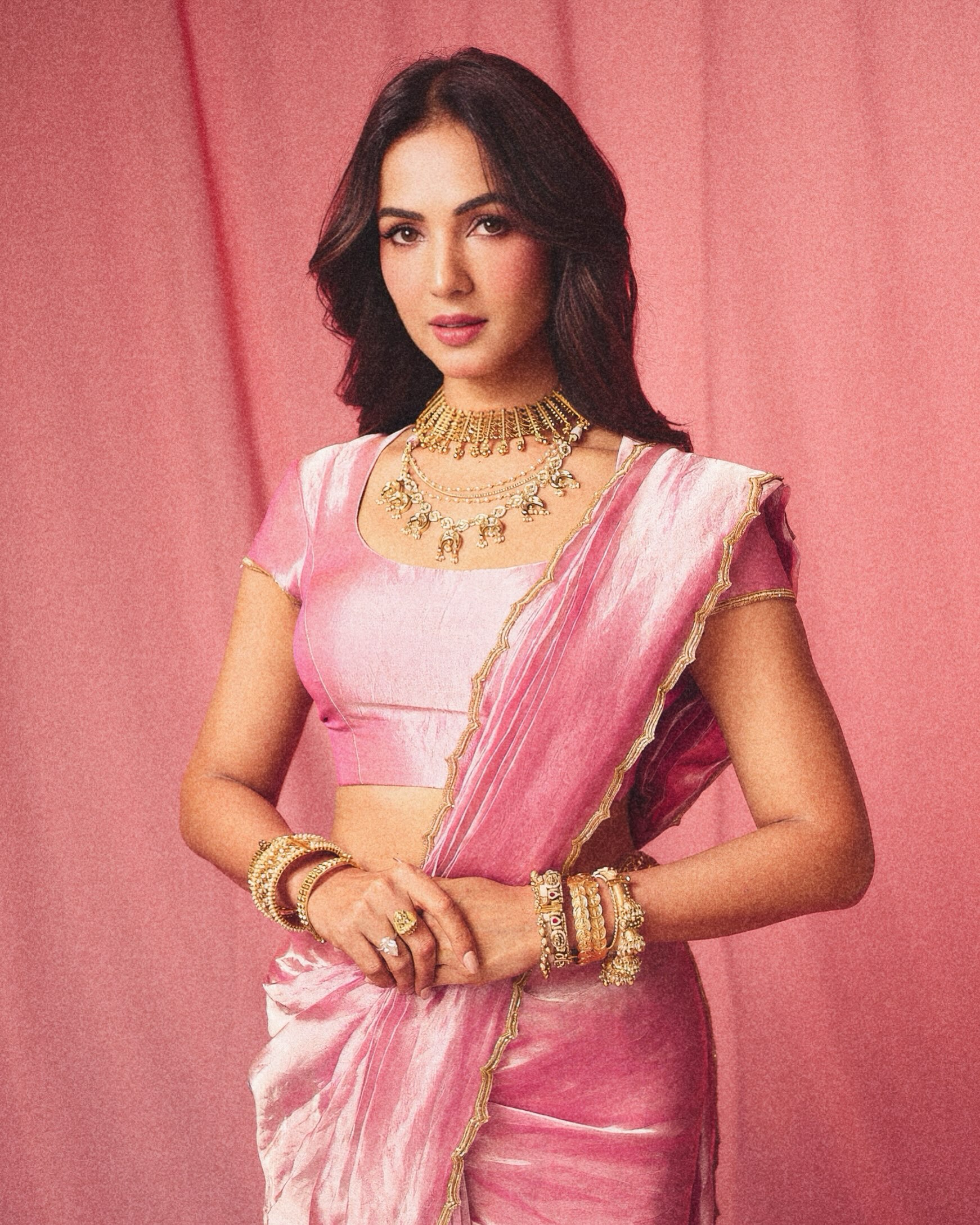 Sonal S Chauhan gives traditional draping a contemporary twist, proving that a monochrome pink palette can be both timeless and fashion-forward.