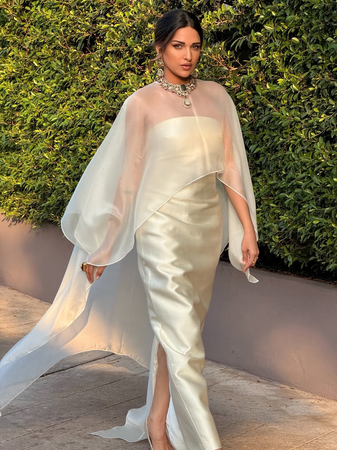 Himanshi Khurana keeps the glam sleek with a polished updo and subtle detailing that complements the refined outfit effortlessly.