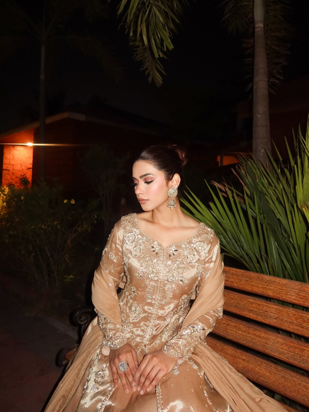 Nagma Mirajkar adds polished earrings and a sleek ring, looking soft, elegant shimmer.