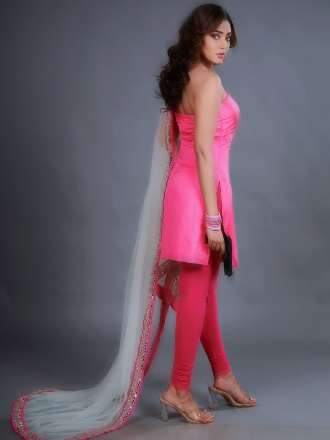 Sana Makbul pairs the look with a soft net dupatta and matching churidar, giving full desi‑barbie energy.