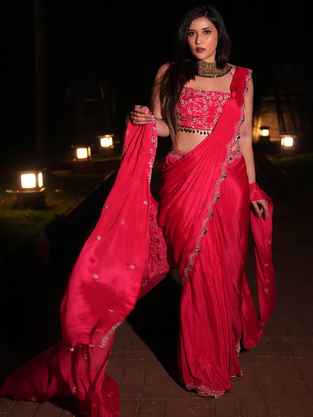 Mannara Chopra pairs the saree with an embellished blouse packed with detailed sparkle and texture.