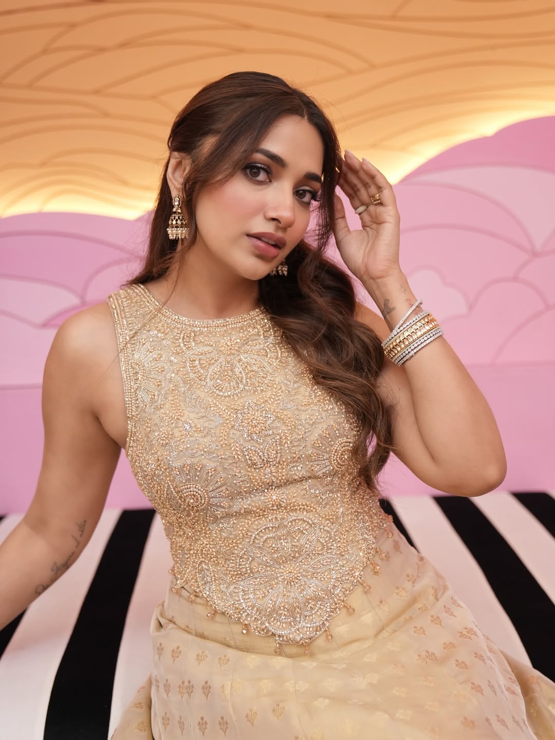 Jiya Shankar stuns in a rich embroidered blouse paired with a flowing gold lehenga that brings full festive energy.