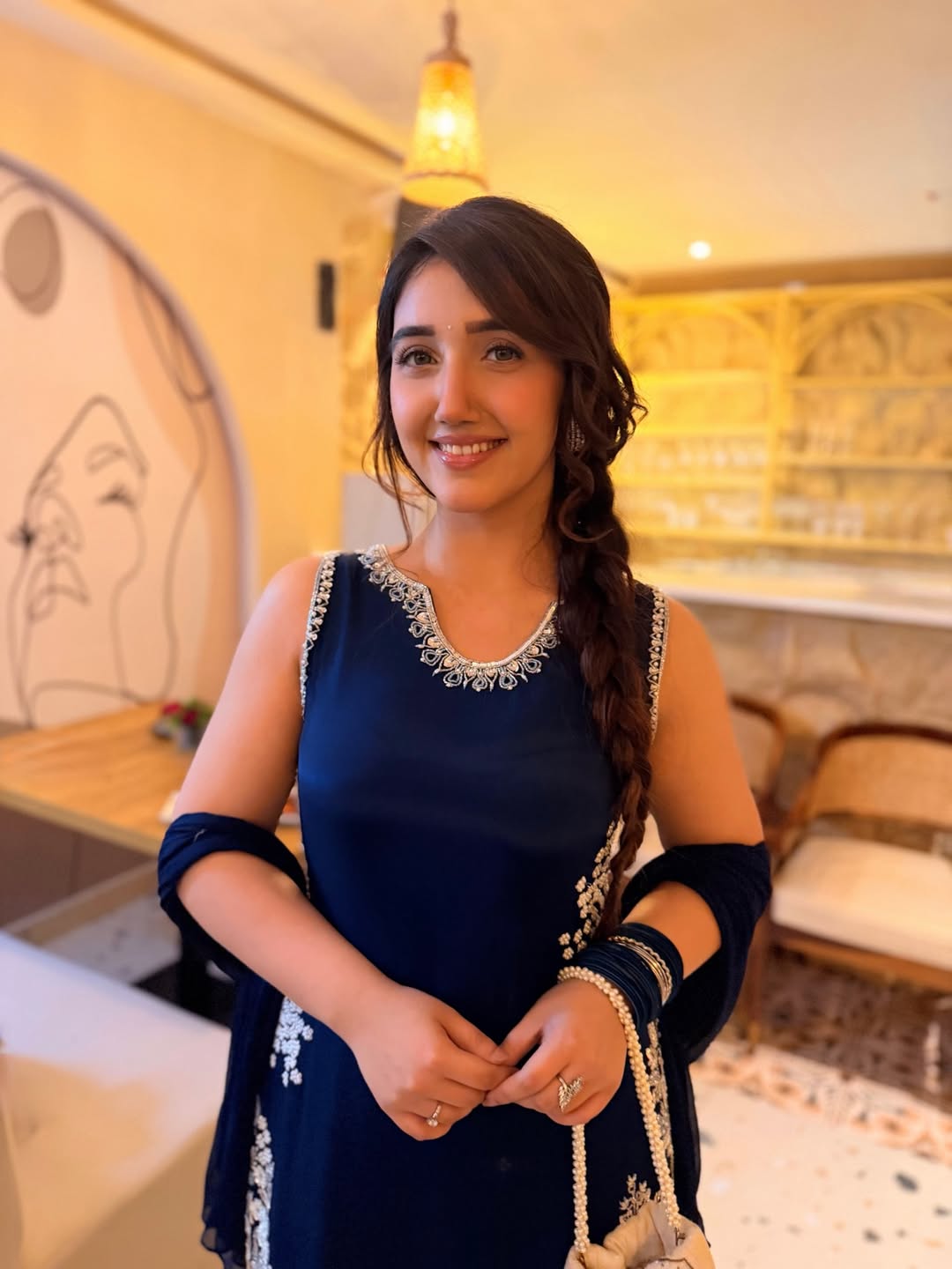 Ashnoor Kaur stuns in silver floral embroidery and a chic, flowy design that elevates the entire look.