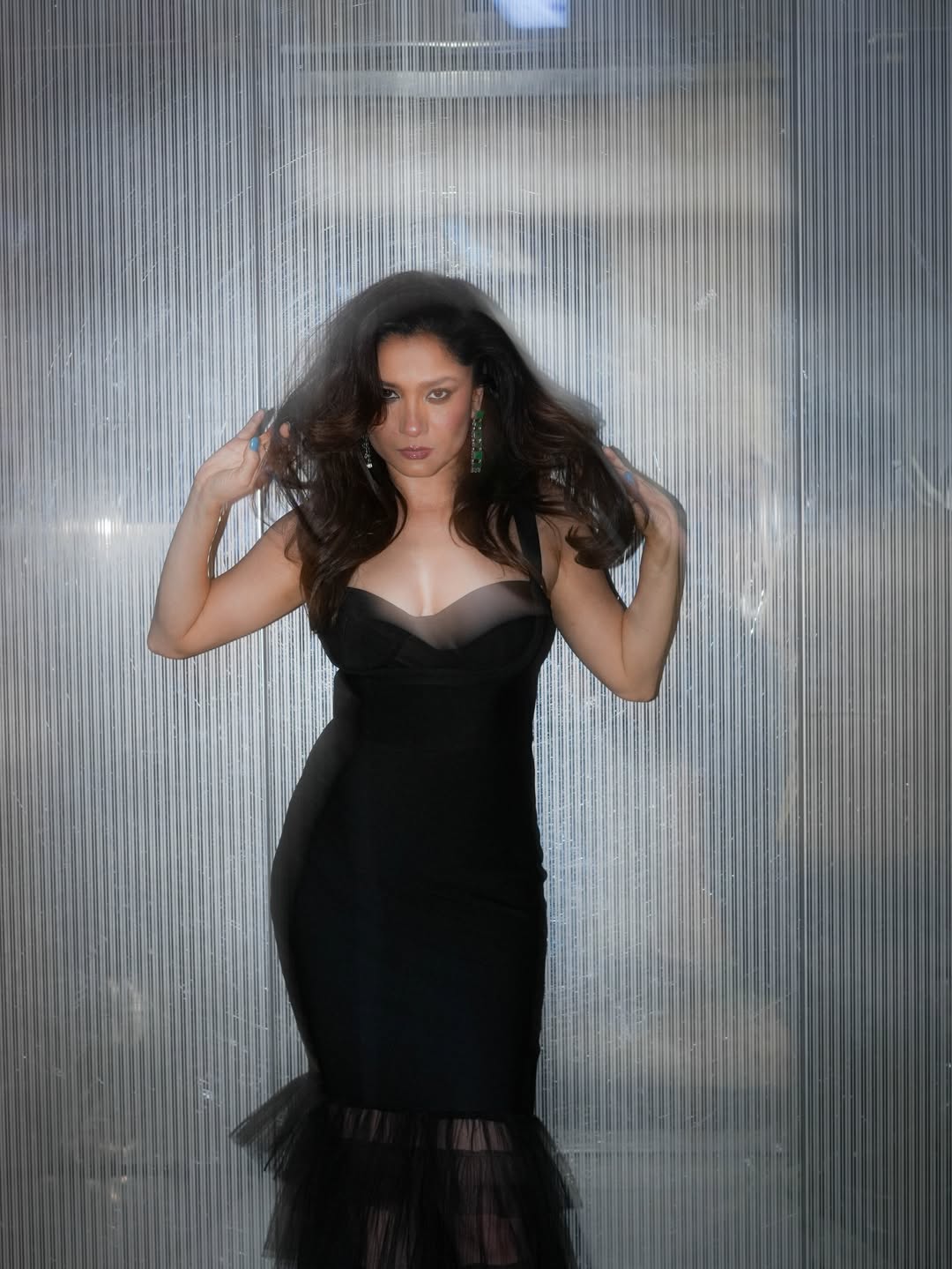 Ankita Lokhande stuns in a sleek black dress with a sculpted bodice and clean, fitted lines.