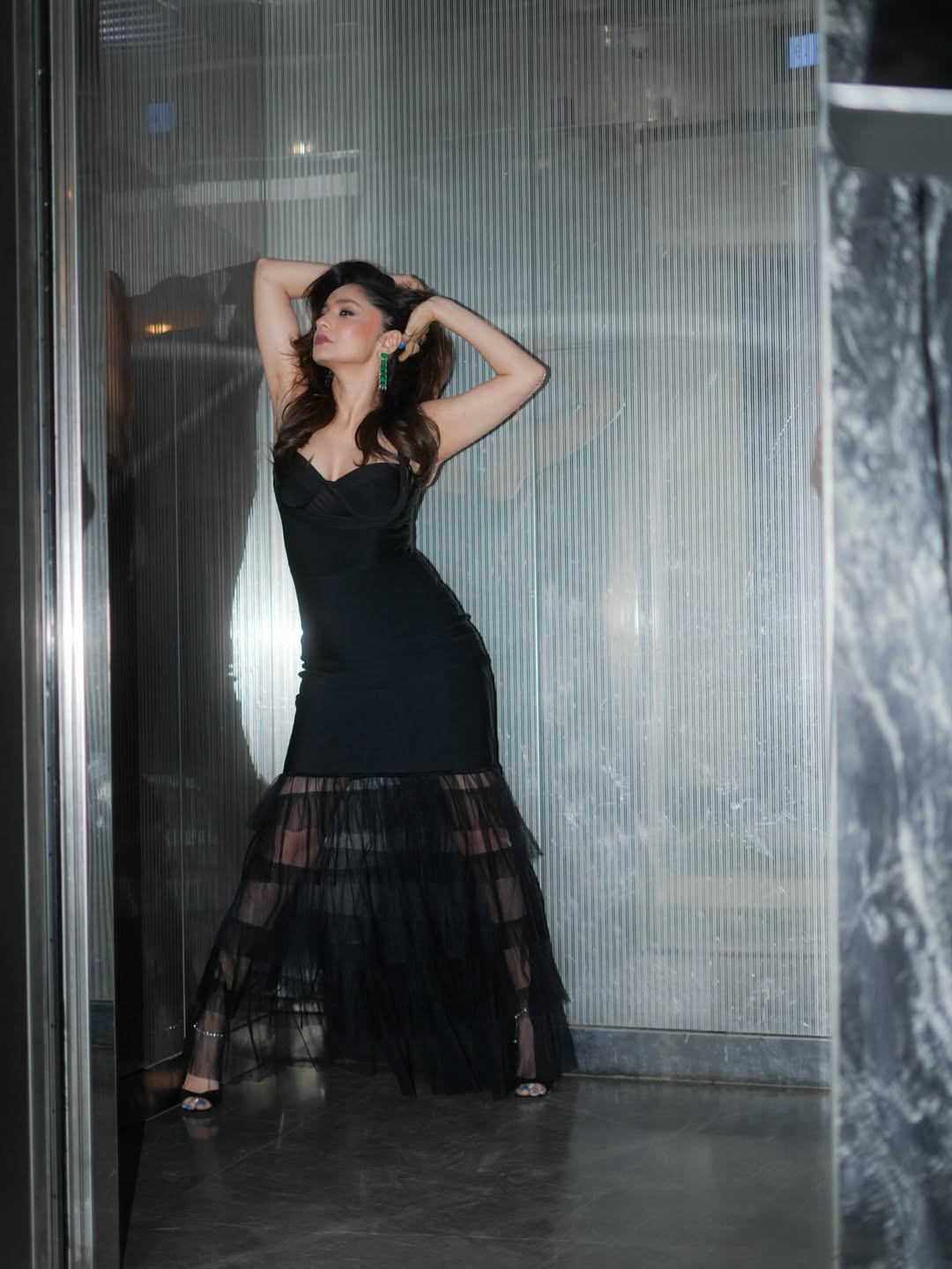 Ankita Lokhande owns the vibe with layered mesh tiers adding movement, texture, and runway‑style flair.