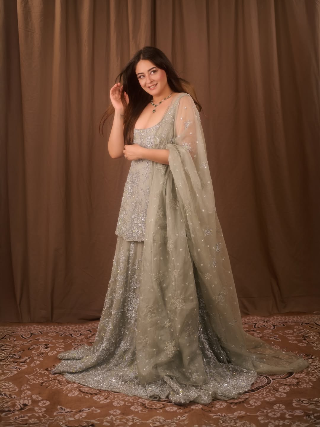 Mahhi Vij stuns in a pastel, flowy silhouette layered with delicate embroidery that gives the outfit a soft, dreamy vibe.