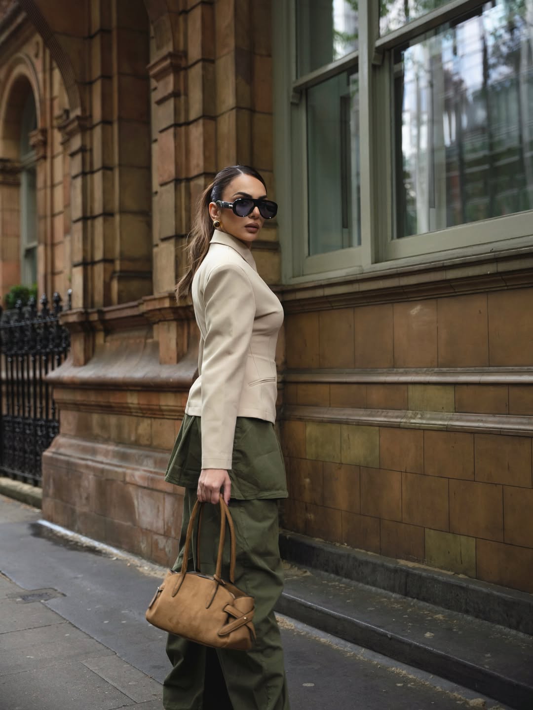 Nitibha Kaul pairs the structured top with loose olive trousers, creating a perfect mix of power and comfort.