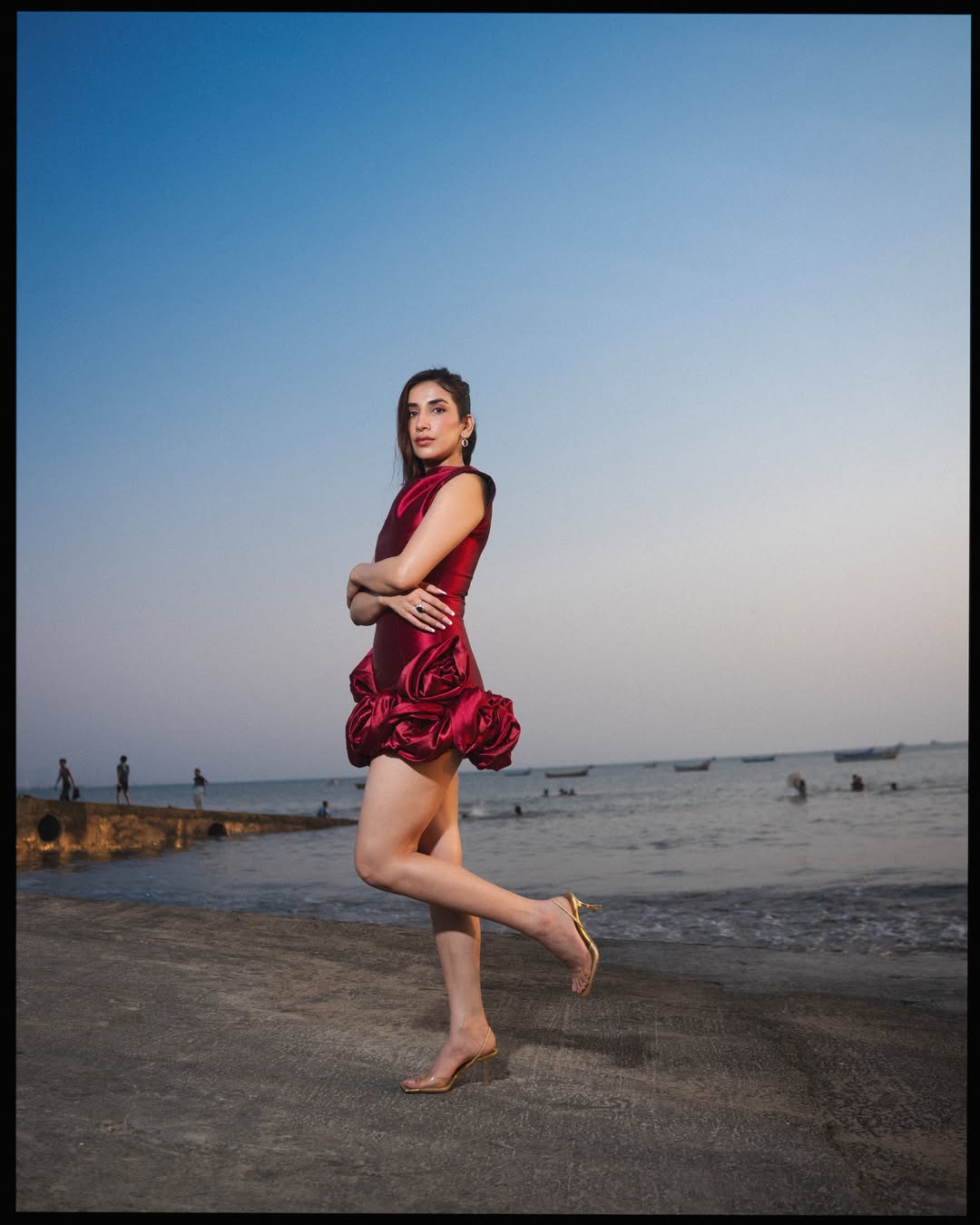 Parul Gulati elevates the look with a structured silhouette that enhances the clean, defined shape of the outfit.