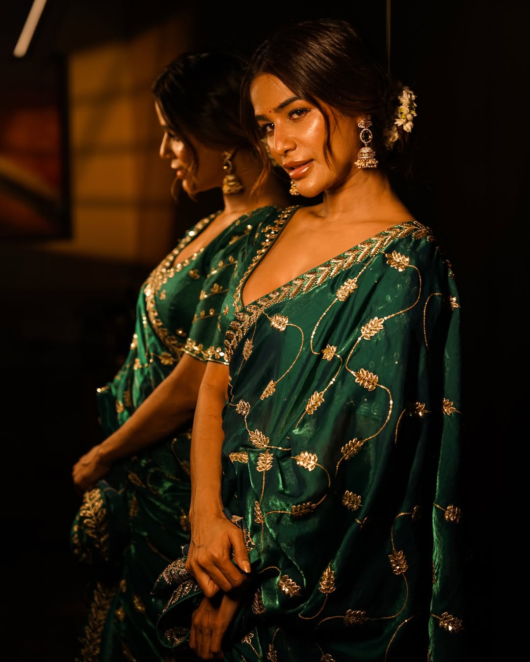 Poonam Pandey Exudes Regal Charm in Emerald Green Saree