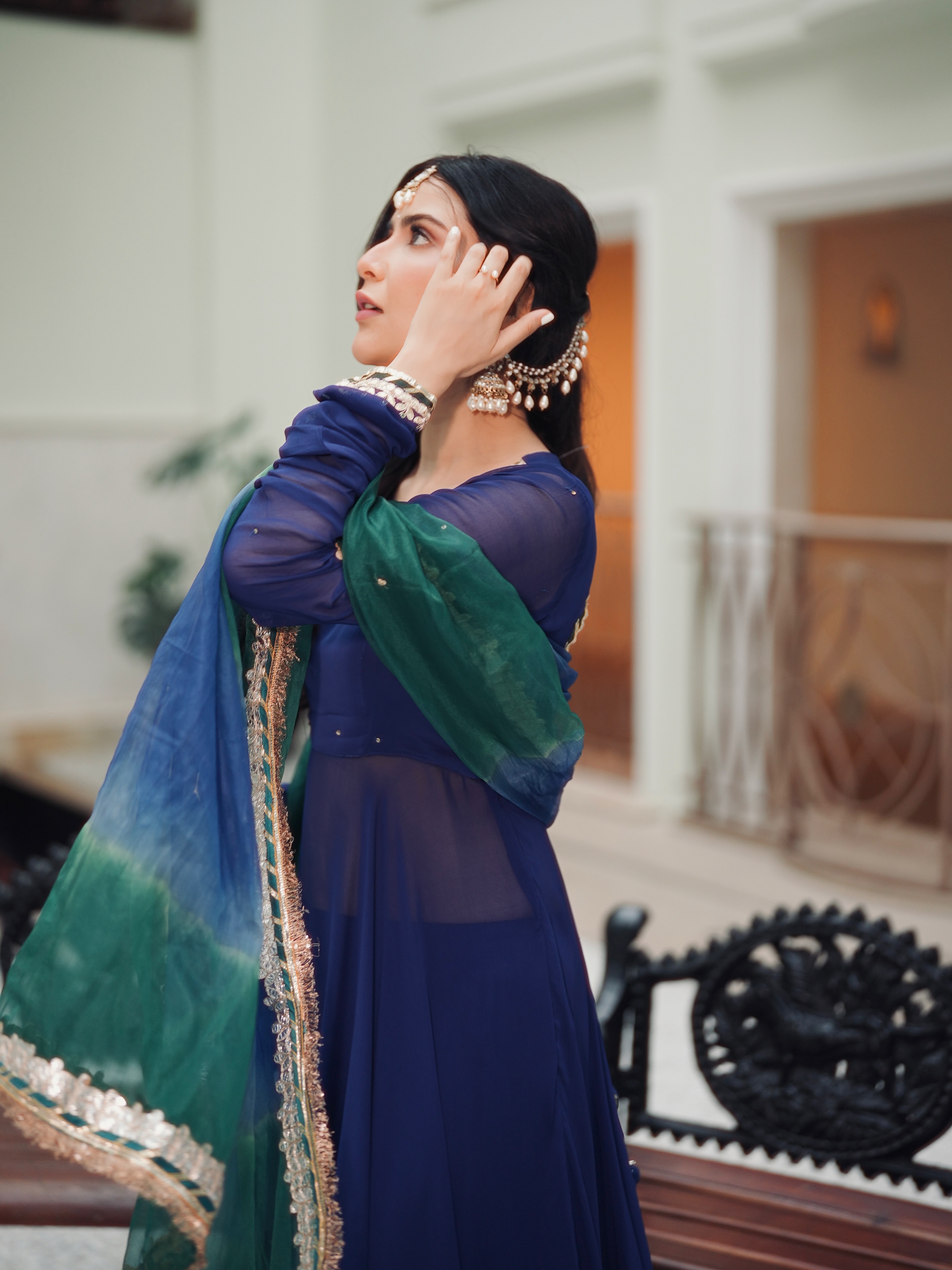 Khanzaadi's classic silhouette brings a sense of understated grace to the look.