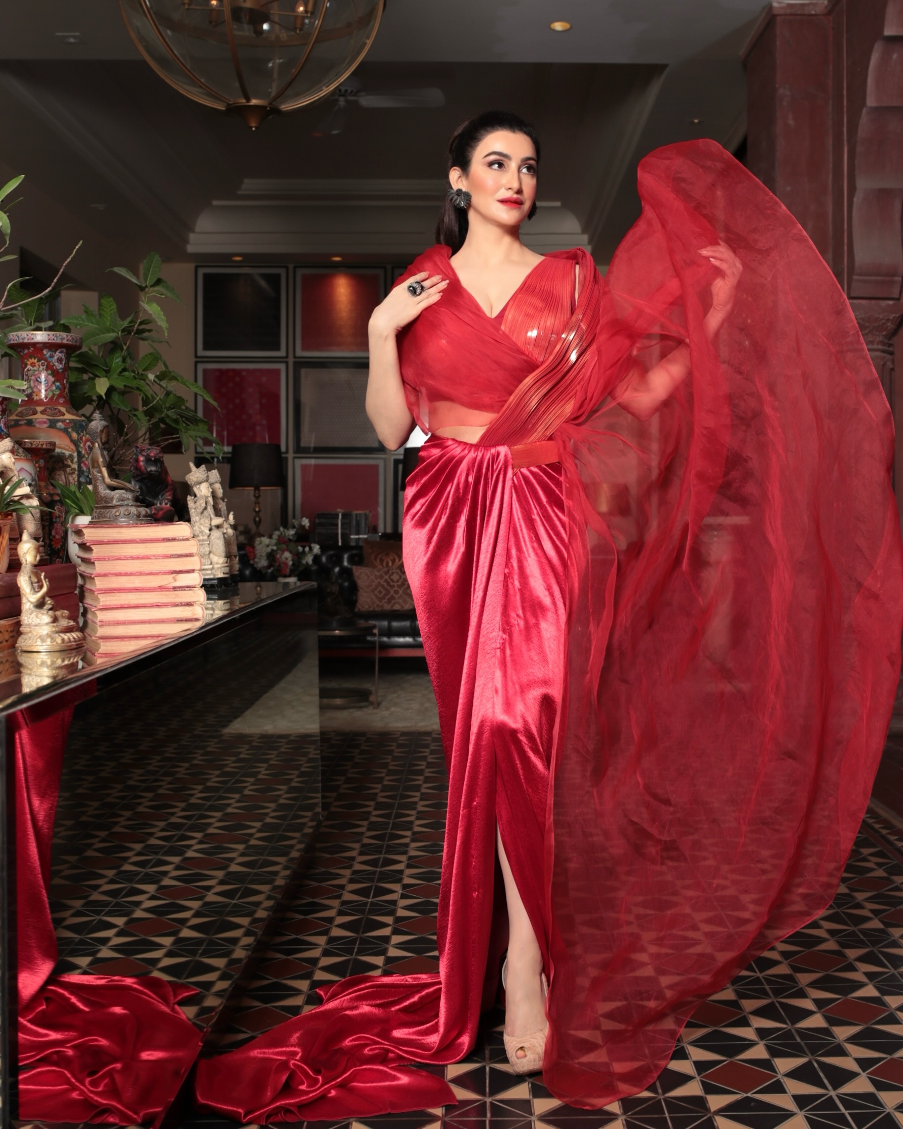 Shalini Passi lets the striking ensemble take center stage with sleek styling and minimal accessories.