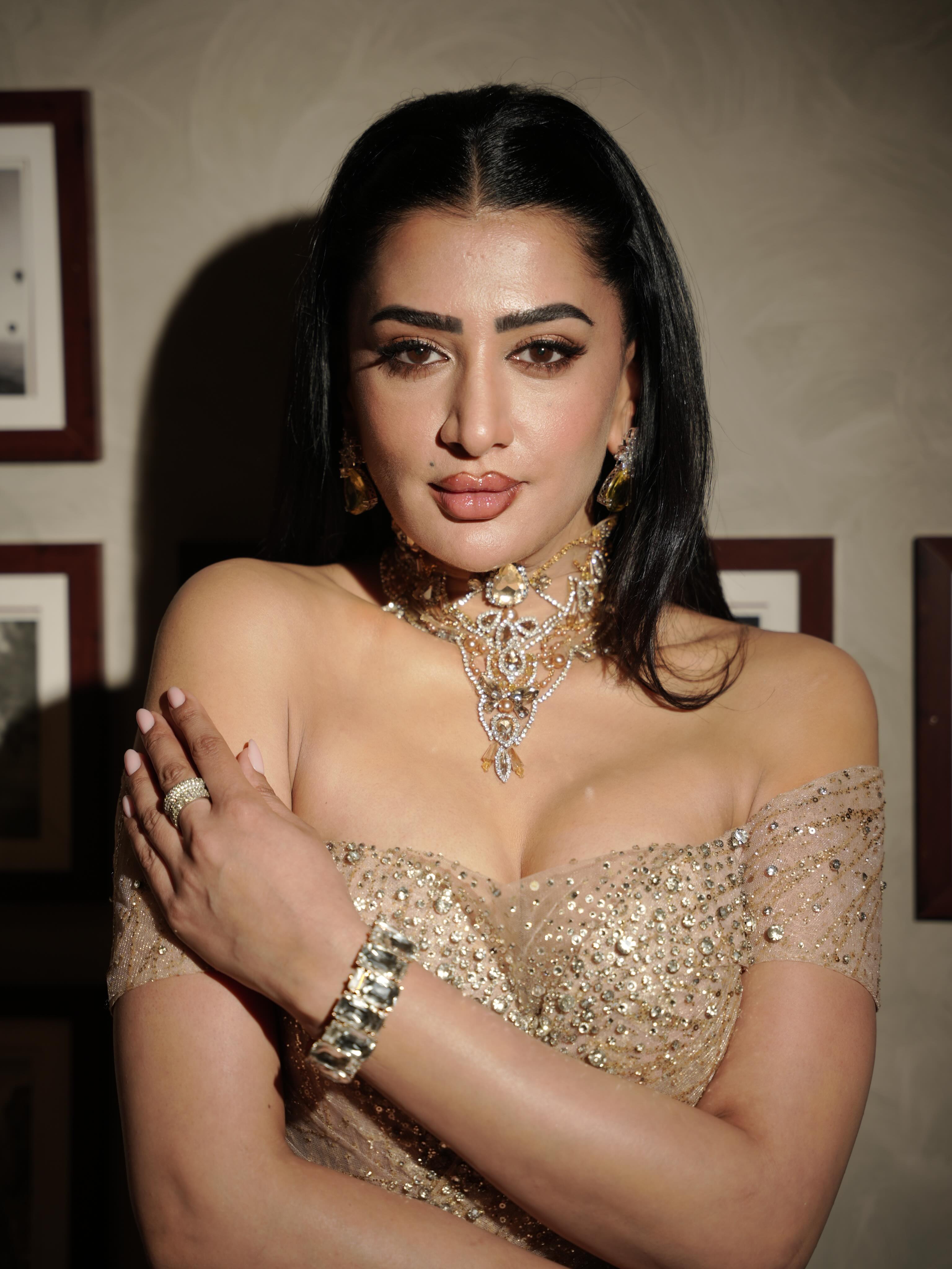 Pamala Serena shines in a sparkling champagne ensemble that effortlessly captures attention.