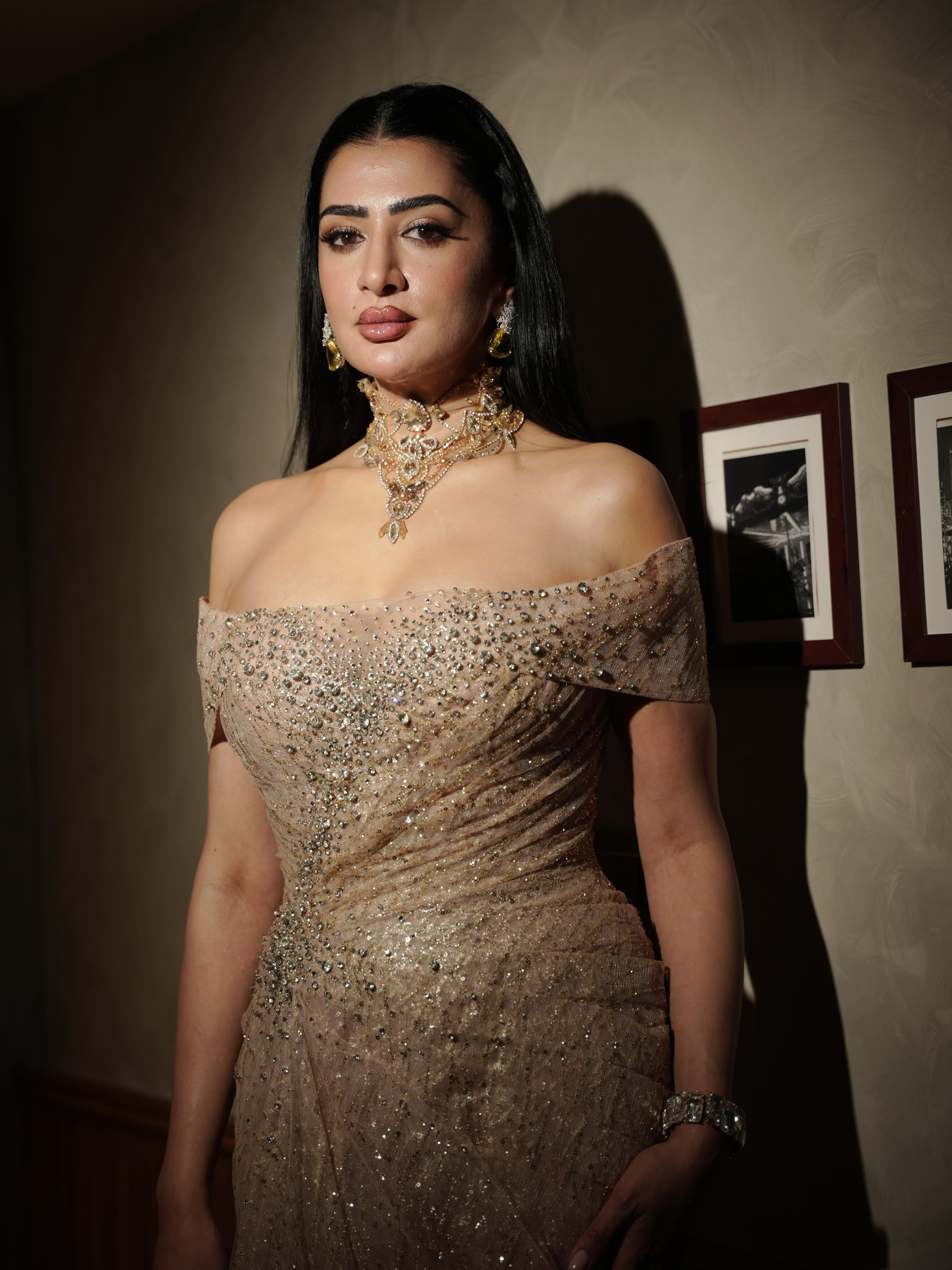 Pamala Serena showcases intricate embellishments that lend the gown a luxurious, couture-inspired finish.