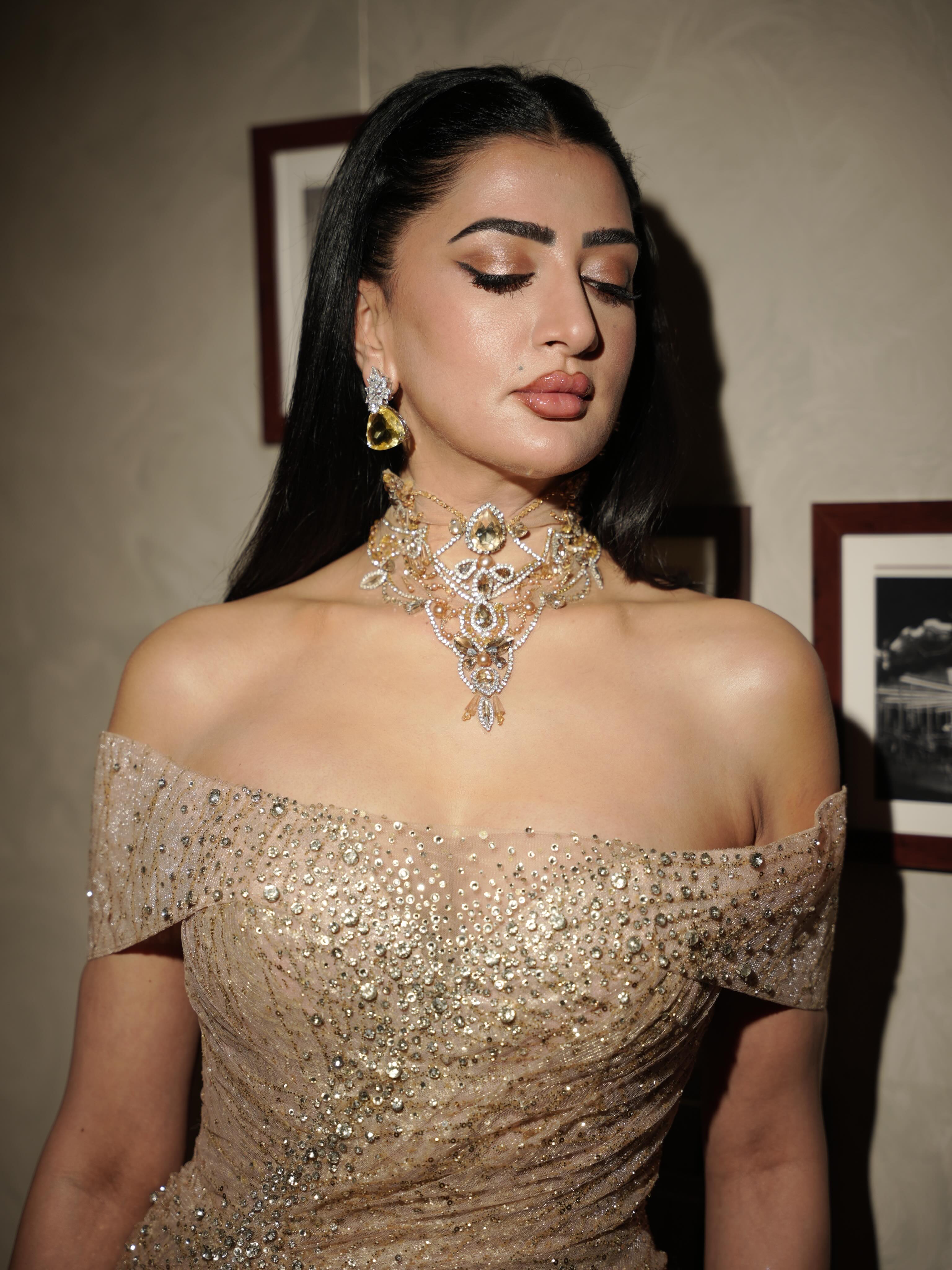 Pamala Serena pairs statement jewelry with shimmering textures for an effortlessly polished look.