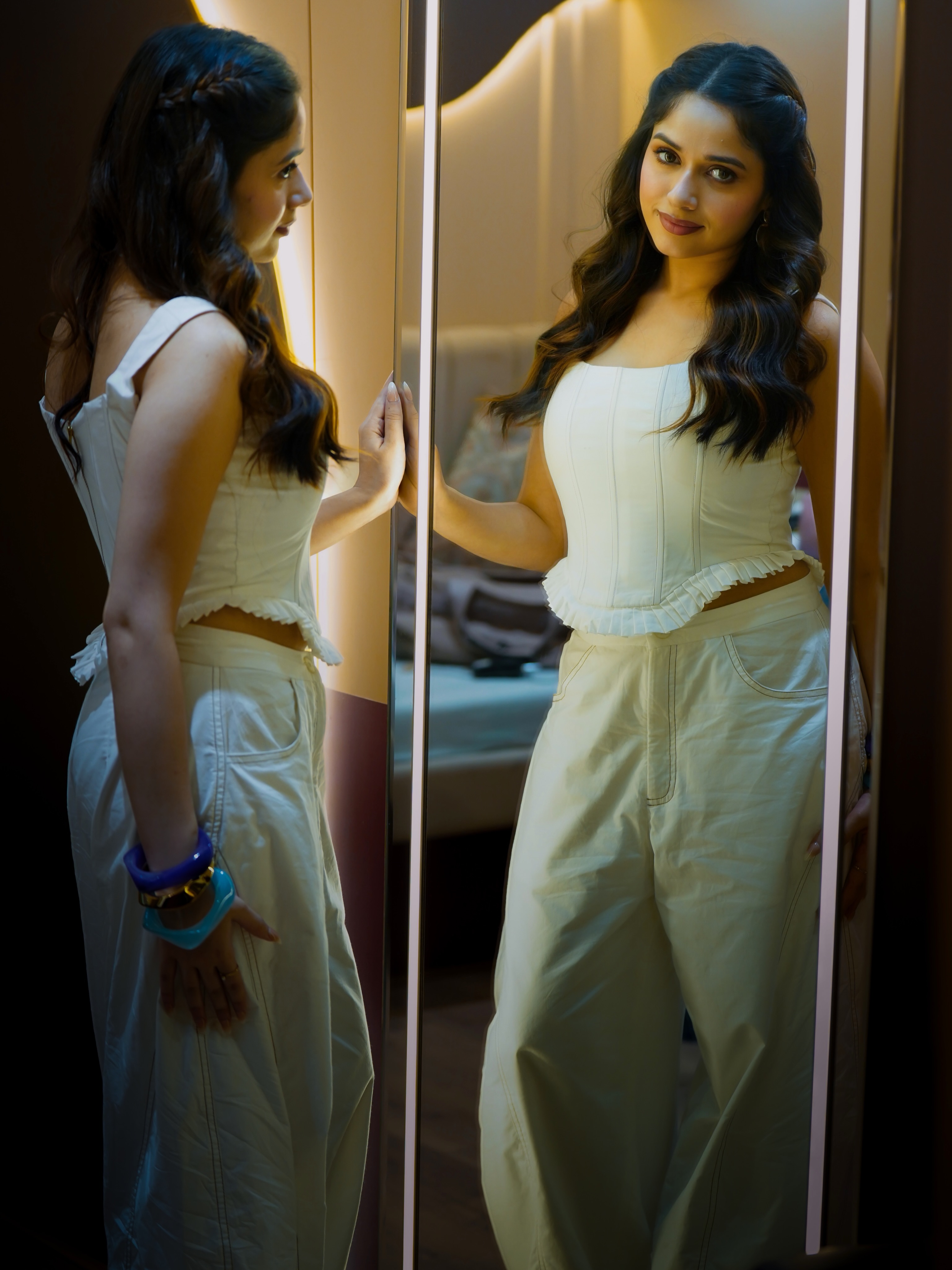 Jannat Zubair keeps the styling understated with delicate rings and a sleek smartwatch, letting the clean silhouette remain the focal point.